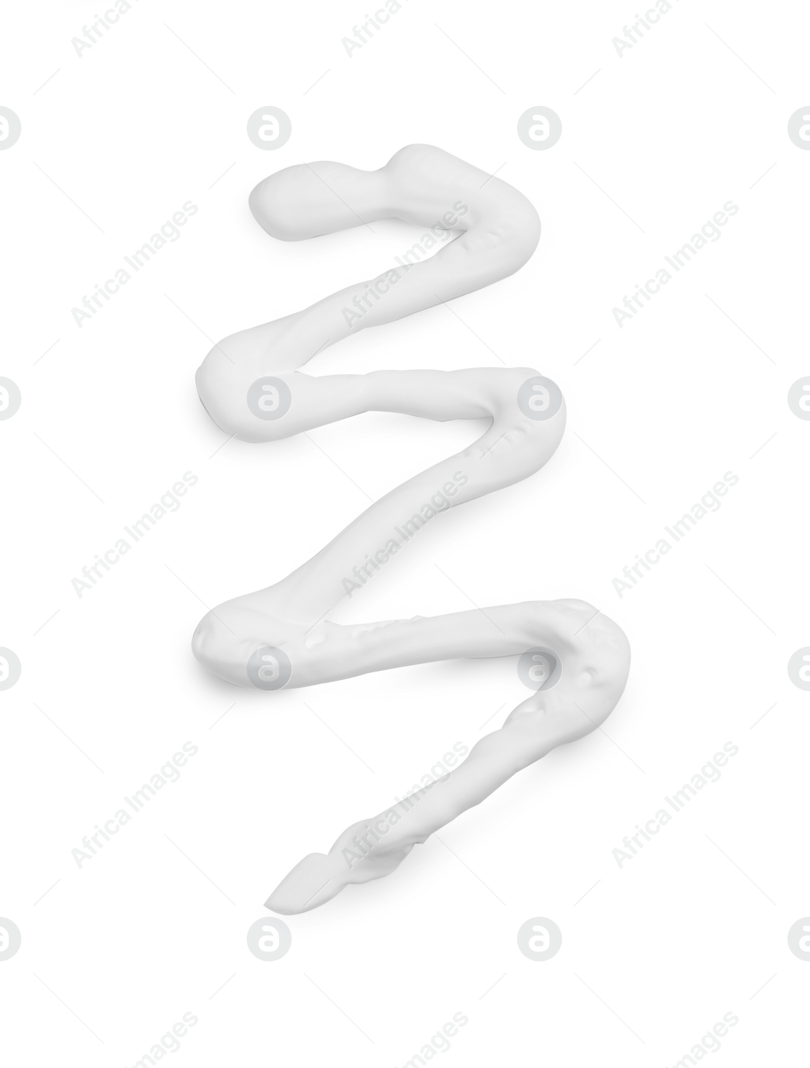 Photo of Smear of shaving foam isolated on white, top view