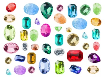 Image of Set of different shiny gemstones for jeweler isolated on white