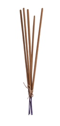 Photo of Many aromatic incense sticks tied with twine on white background