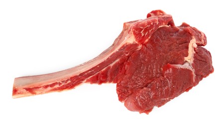 Photo of Raw ribeye steak isolated on white, top view