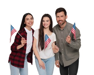 4th of July - Independence day of America. Happy family with national flags of United States on white background