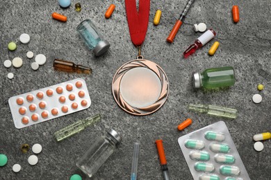 Flat lay composition with drugs on grey table. Doping control