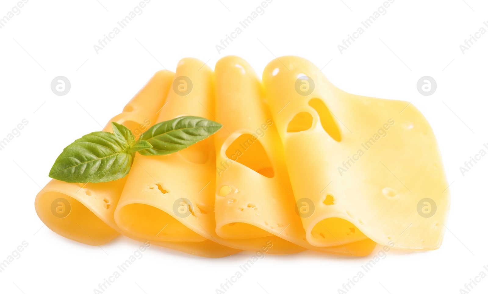 Photo of Slices of tasty maasdam cheese with basil on white background