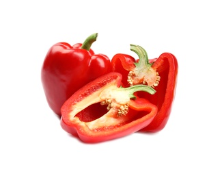 Photo of Whole and cut red bell peppers on white background