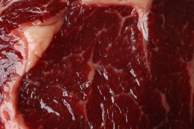 Photo of Texture of fresh beef meat as background, top view