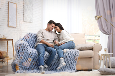 Happy couple spending time together at home. Winter vacation