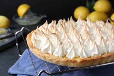 Photo of Delicious lemon meringue pie on table, closeup