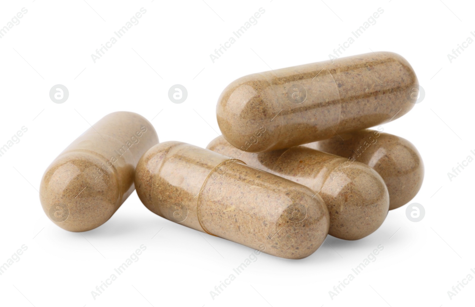 Photo of Pile of vitamin capsules isolated on white