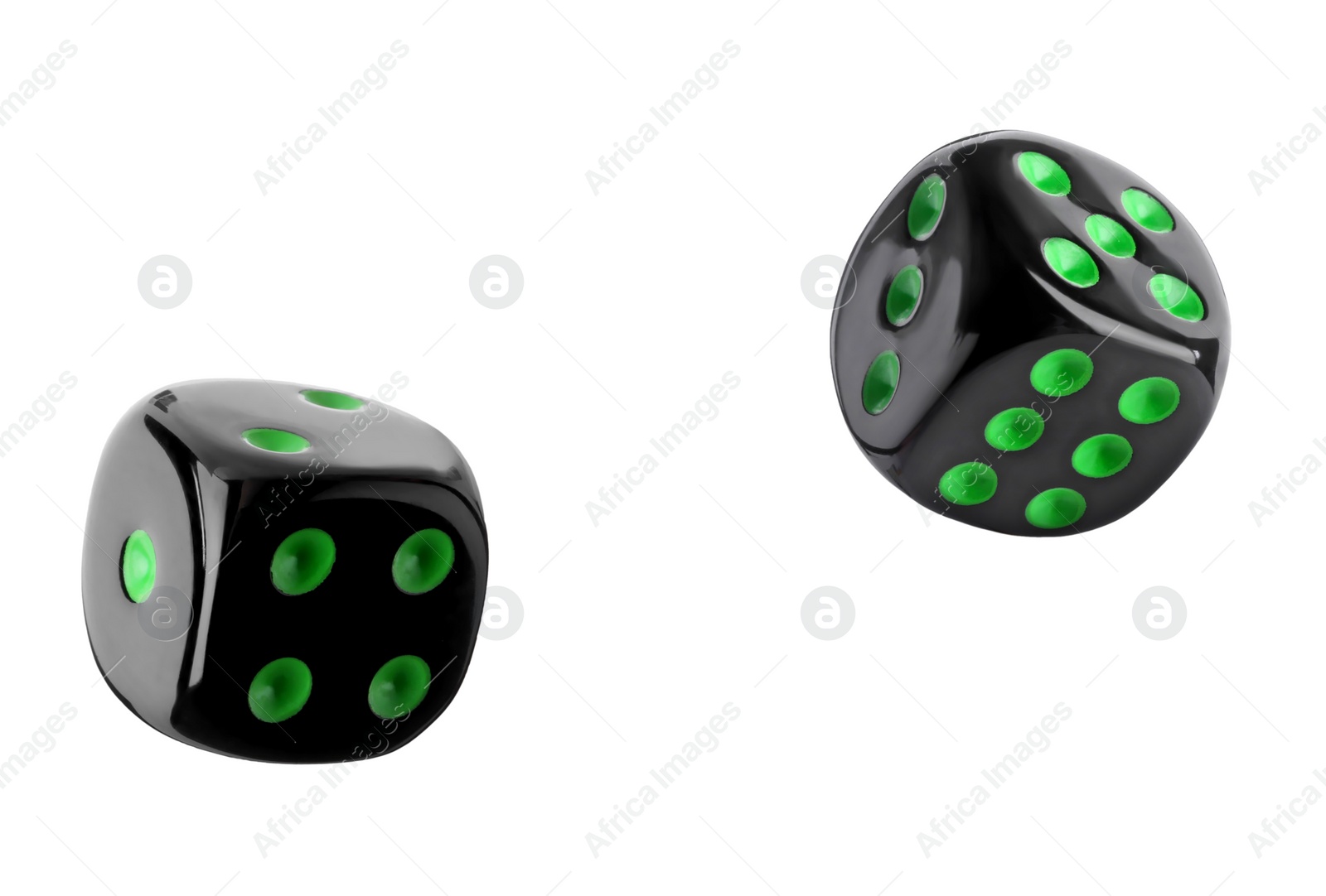 Image of Two black dice in air on white background