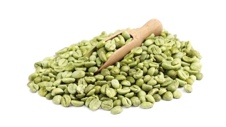Photo of Pile of green coffee beans and wooden scoop on white background