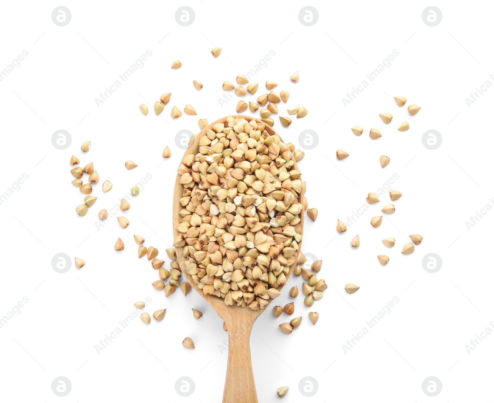 Photo of Uncooked green buckwheat grains in spoon isolated on white, top view