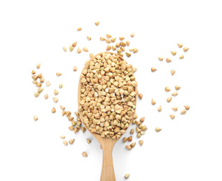 Photo of Uncooked green buckwheat grains in spoon isolated on white, top view