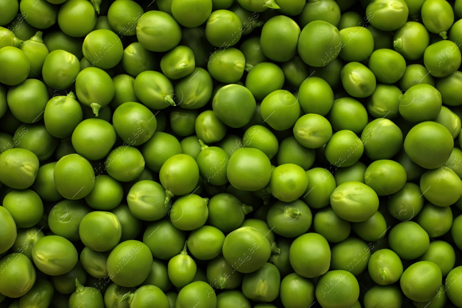 Photo of Fresh raw green peas as background, top view