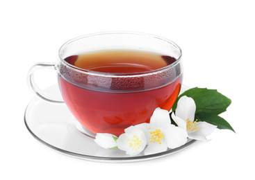 Photo of Cup of tea and fresh jasmine flowers isolated on white