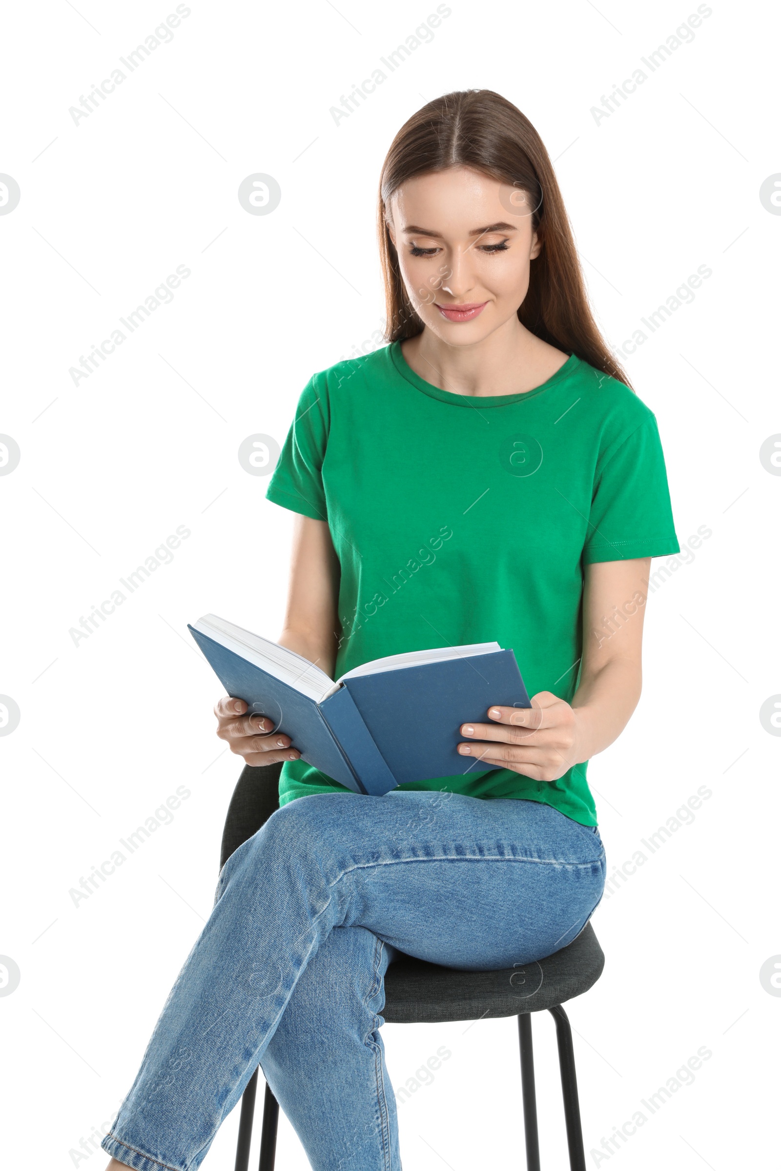 Photo of Young woman reading book on white background