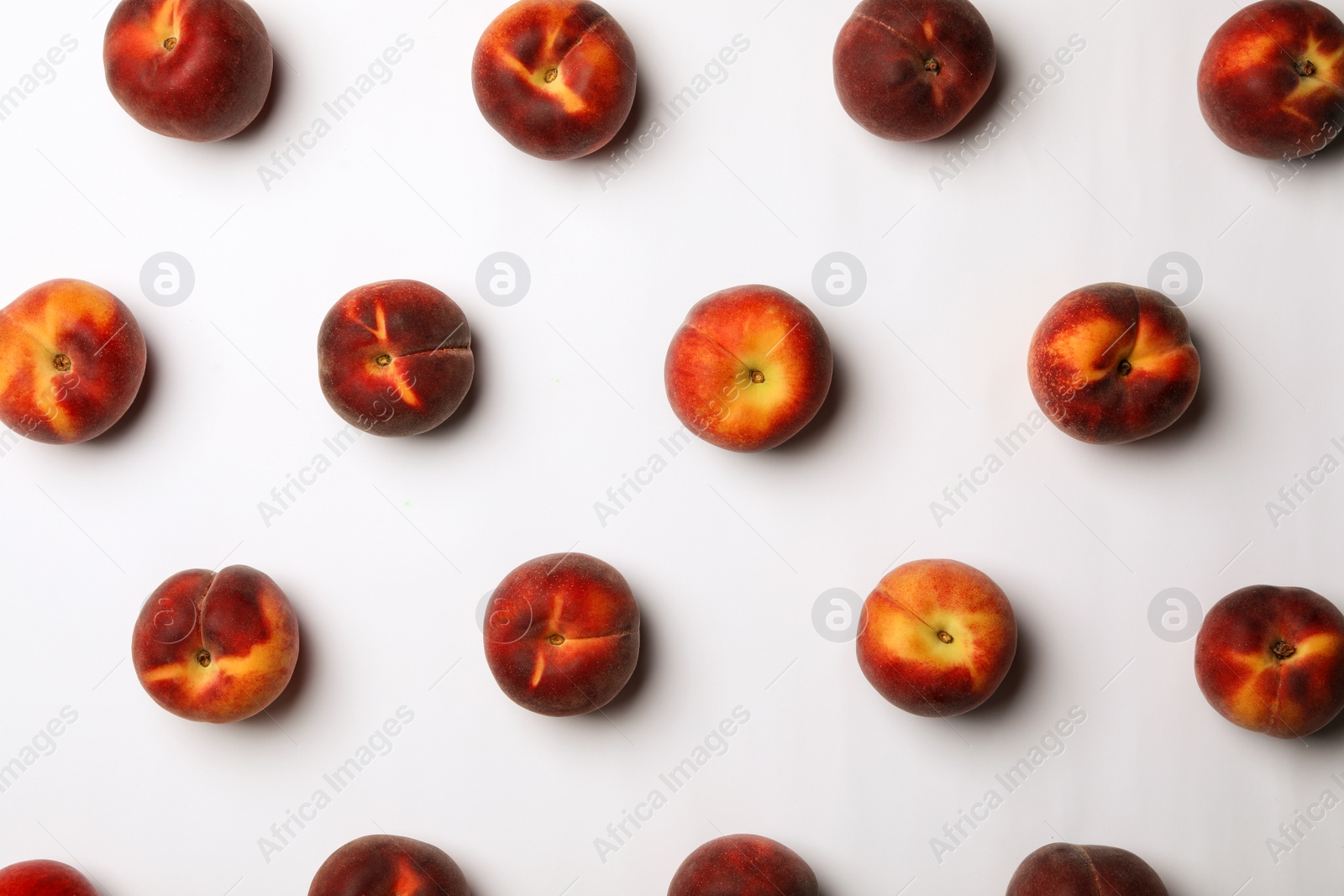 Photo of Flat lay composition with sweet juicy peaches on light background