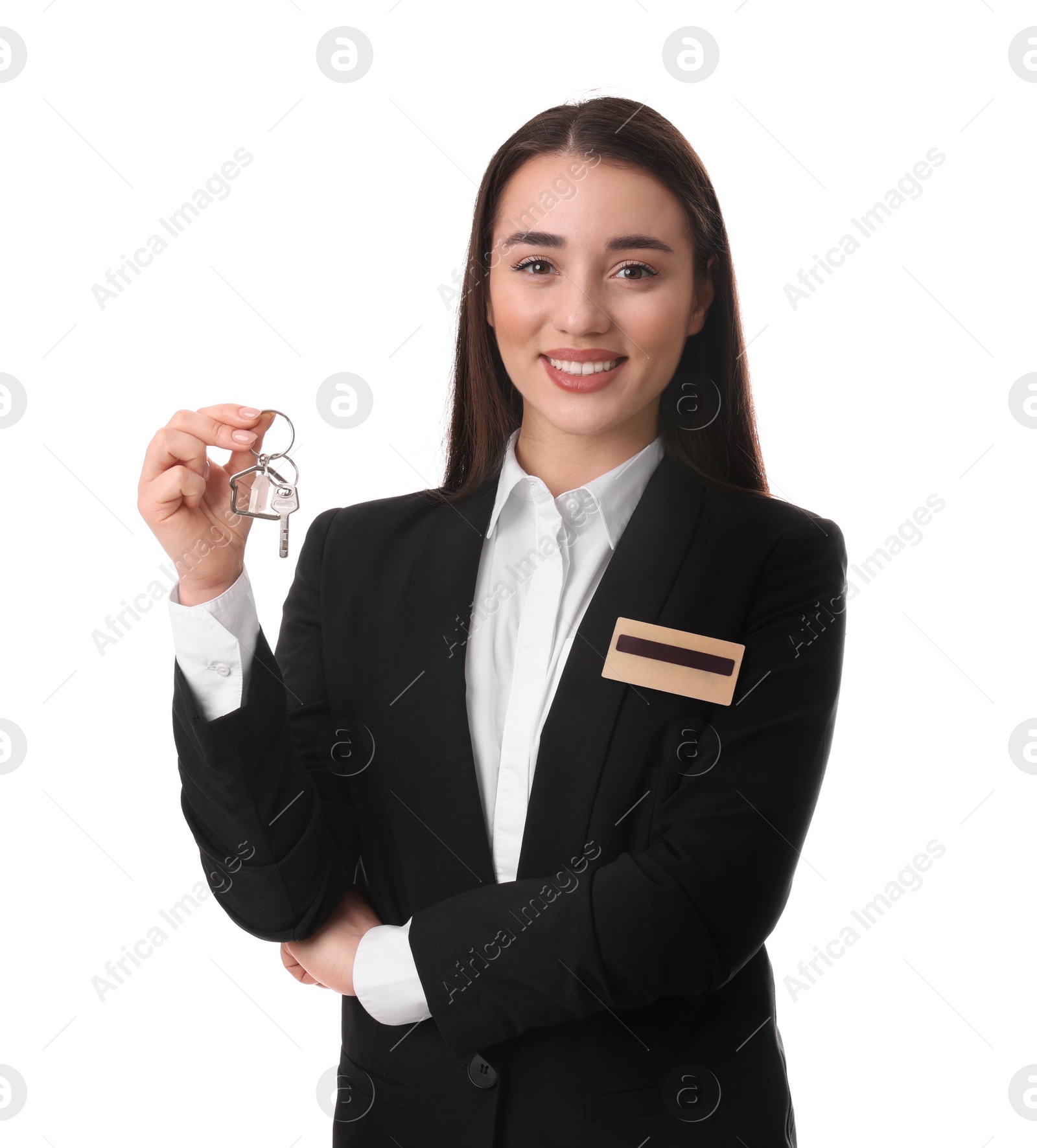 Photo of Happy young receptionist in uniform holding key on white background