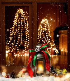 Image of Beautiful composition with Christmas lantern near window