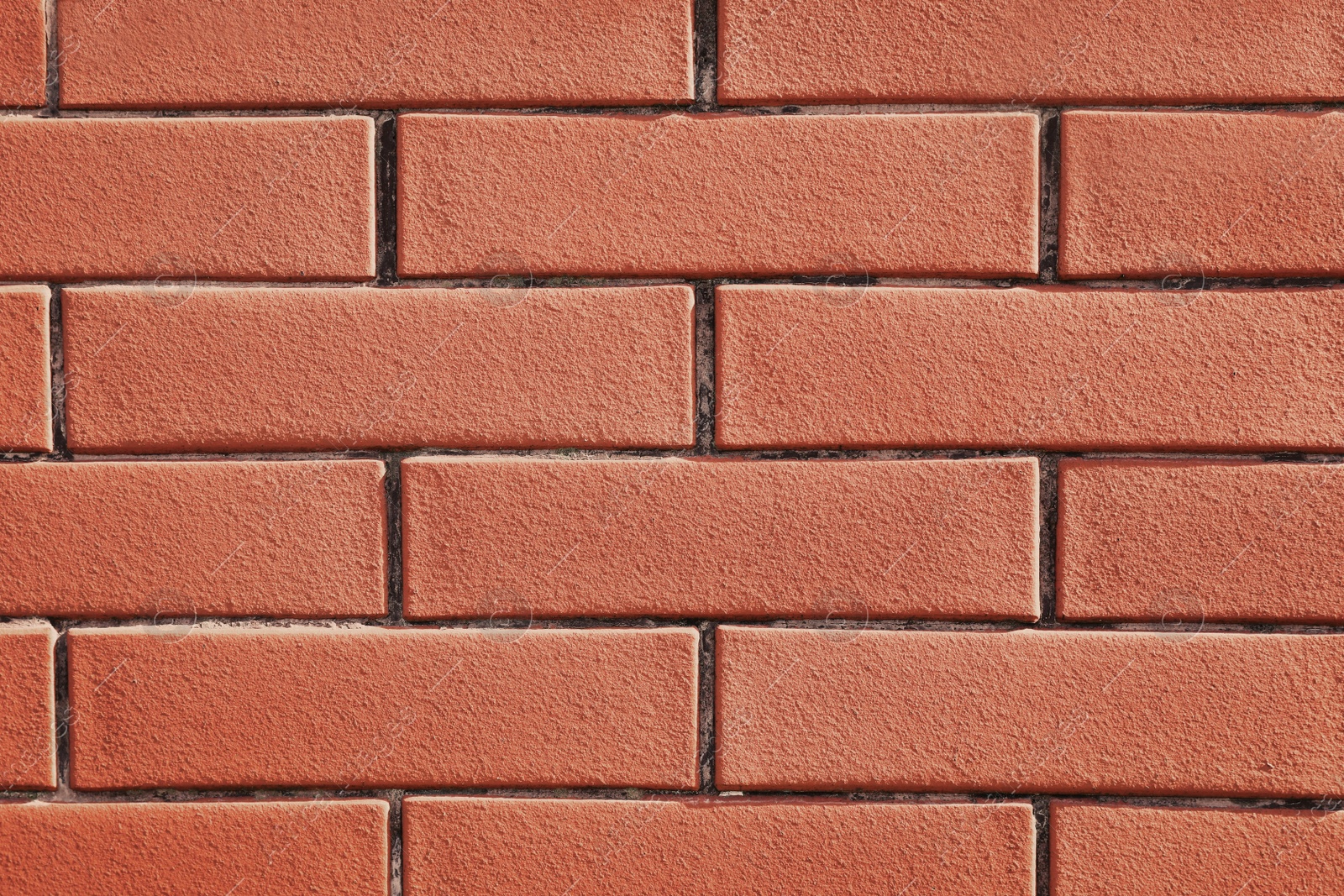 Photo of Texture of red brick wall as background