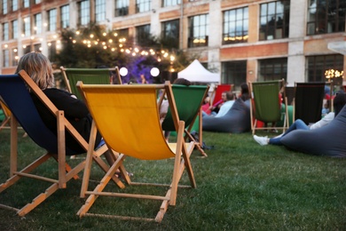 Modern open air cinema with comfortable seats in public park