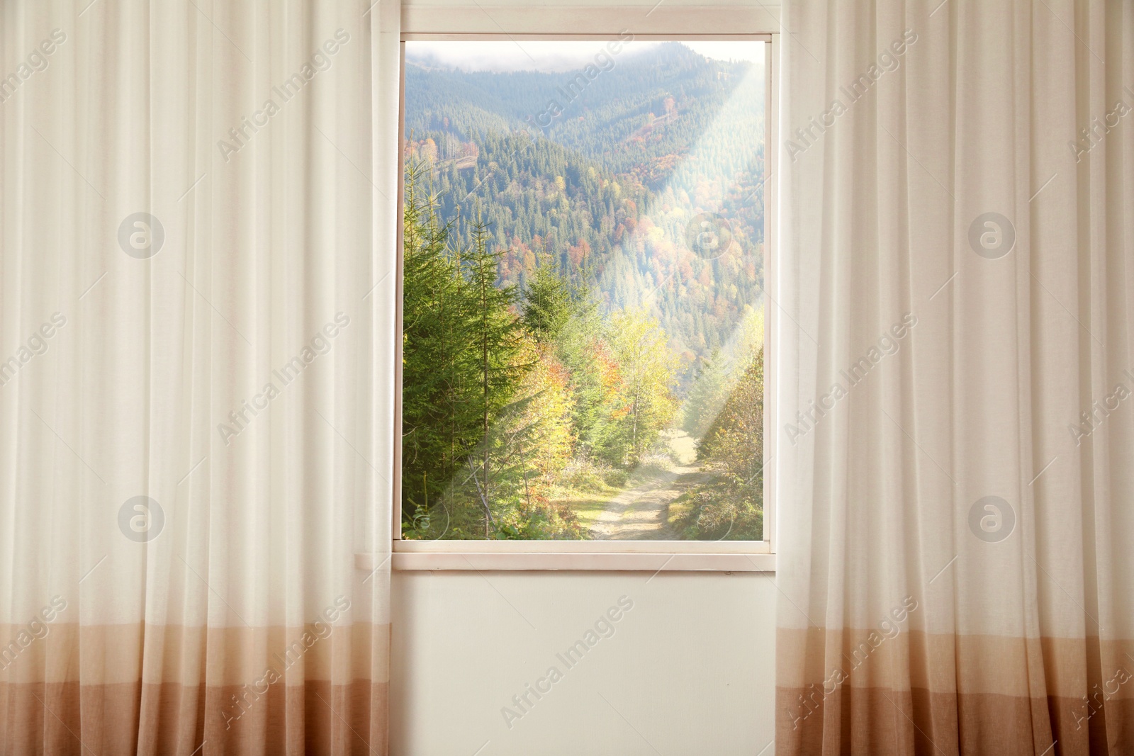 Image of Beautiful view of mountain landscape through window