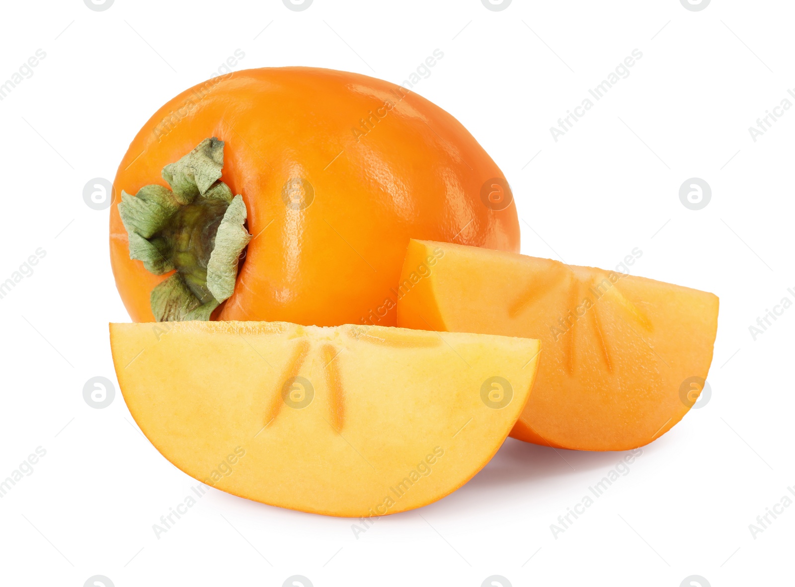 Photo of Whole and cut persimmon fruits isolated on white