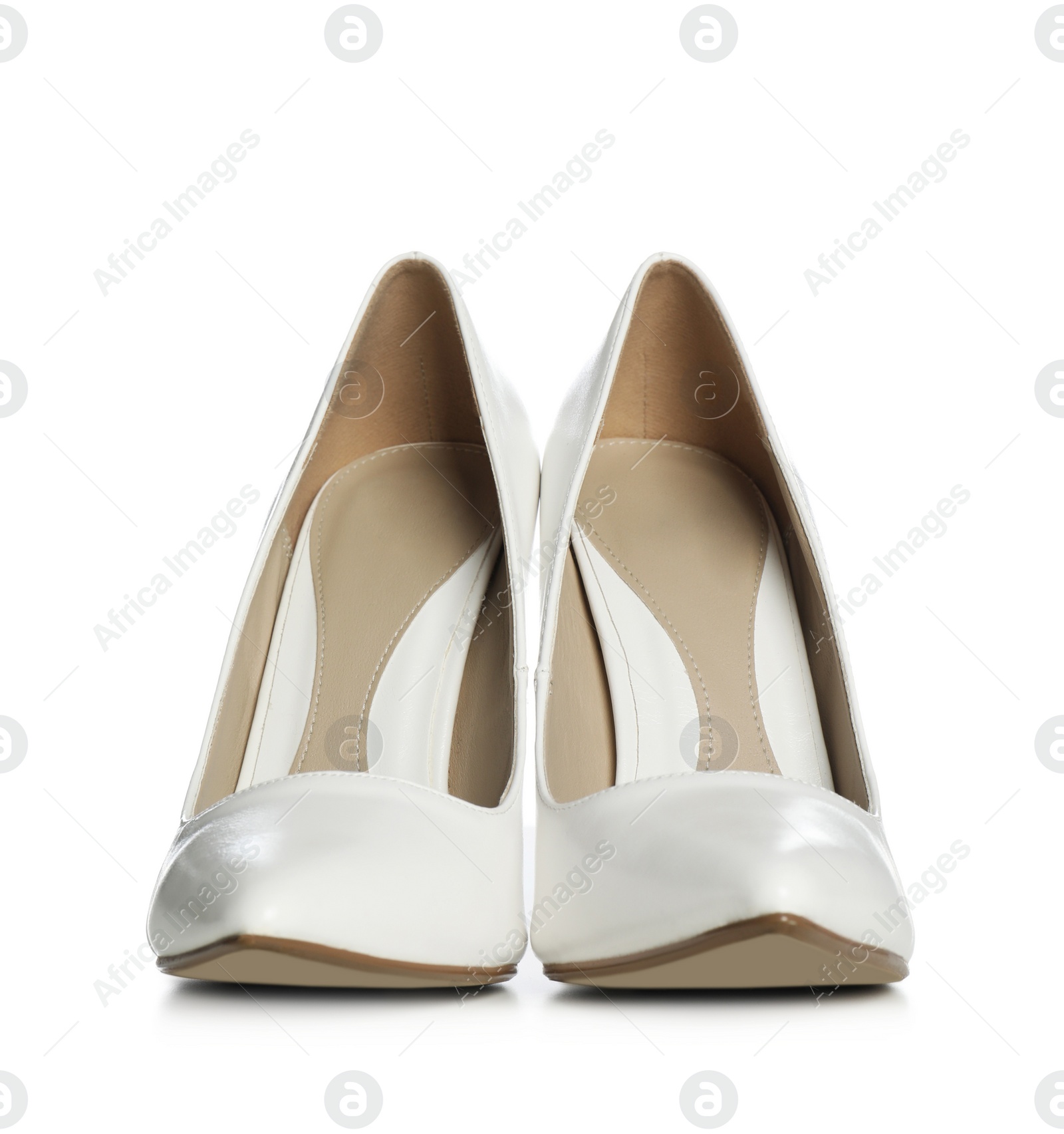 Photo of Beautiful classic wedding shoes on white background