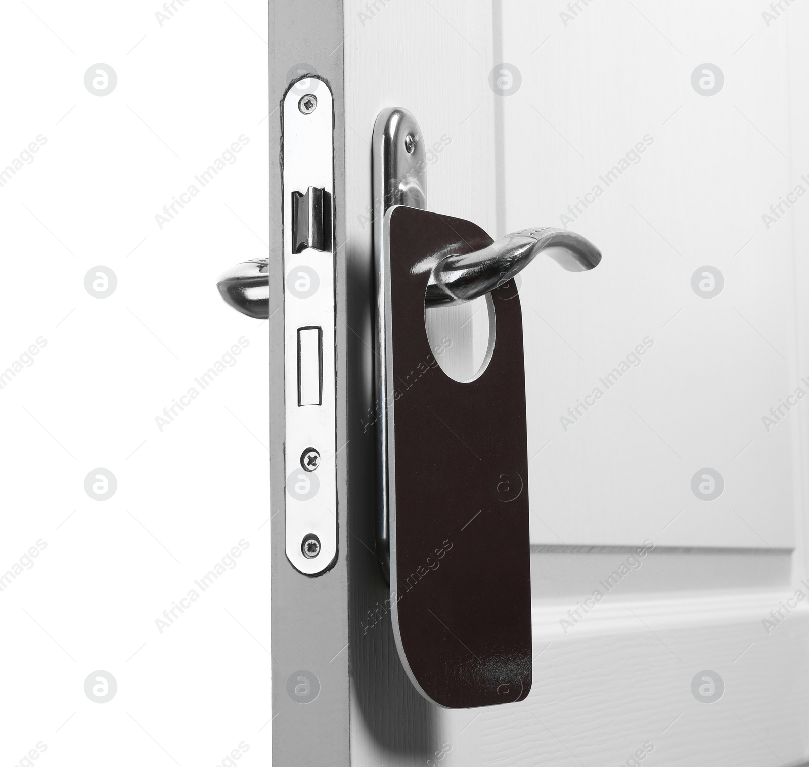 Photo of Hotel wooden door with blank hanger on white background, closeup