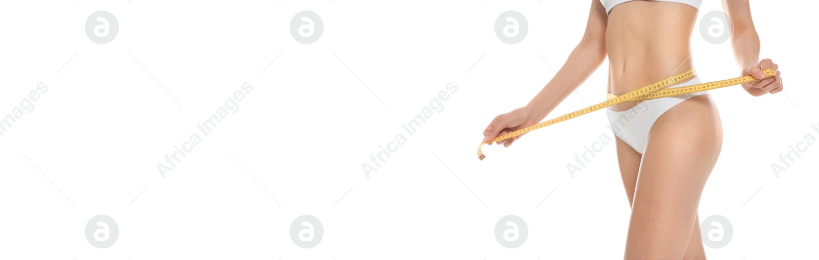 Image of Closeup view of slim woman in underwear with measuring tape on white background. Banner design