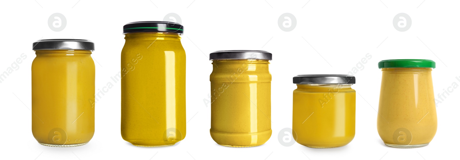 Image of Set with different glass jars of spicy mustard on white background. Banner design