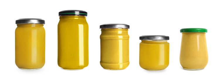 Image of Set with different glass jars of spicy mustard on white background. Banner design