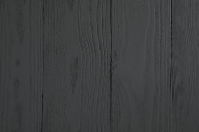 Photo of Texture of grey wooden surface as background, closeup