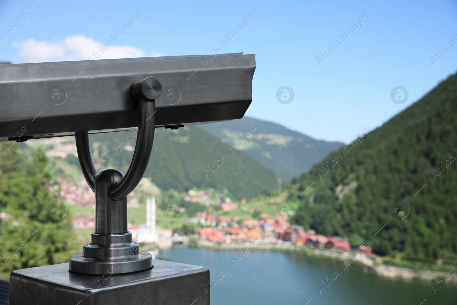 Photo of Observation viewer in mountains outdoors. Space for text