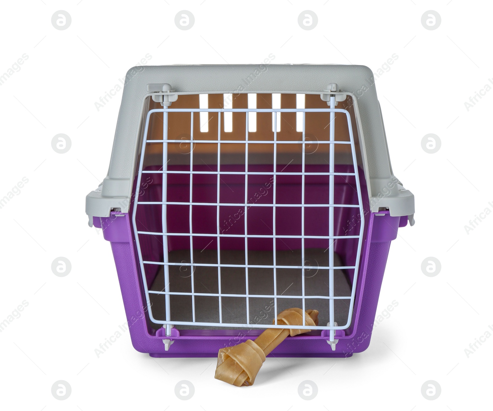 Photo of Violet pet carrier with chewing bone isolated on white