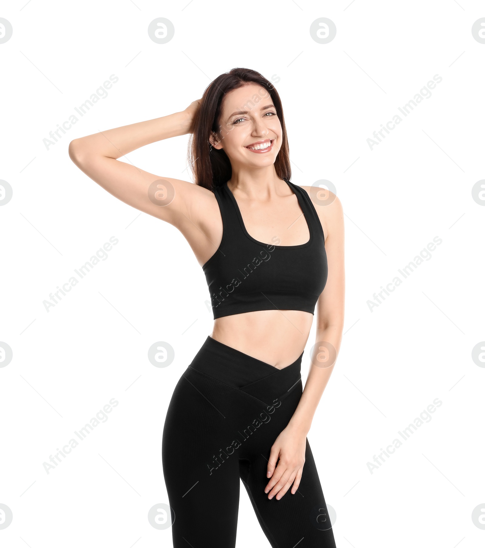 Photo of Happy young woman with slim body posing on white background