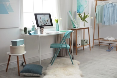 Stylish workplace interior with modern computer on desk