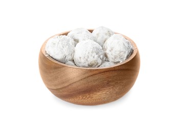 Photo of Wooden bowl full of tasty Christmas snowball cookies isolated on white