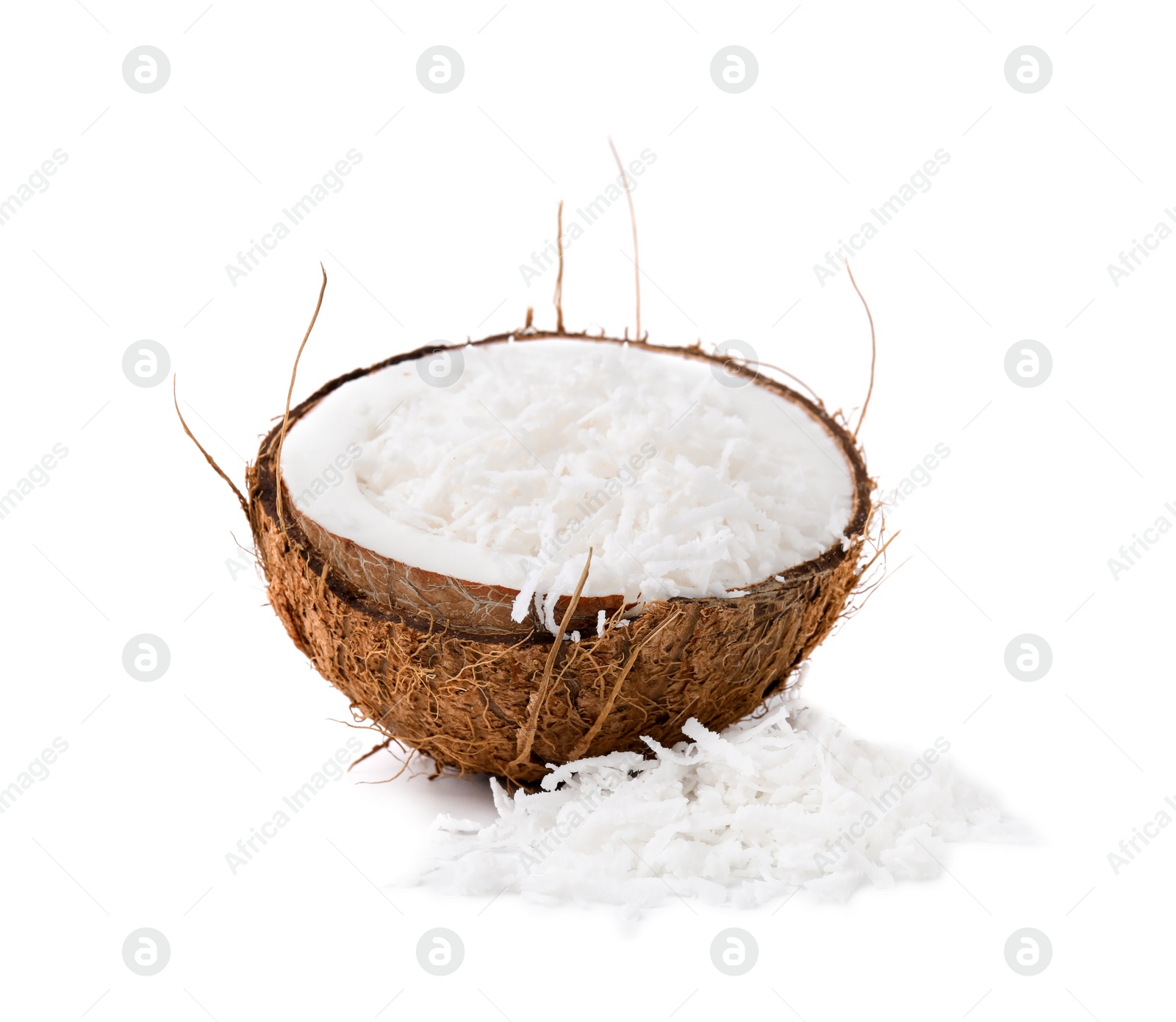 Photo of Coconut flakes in nut shell isolated on white