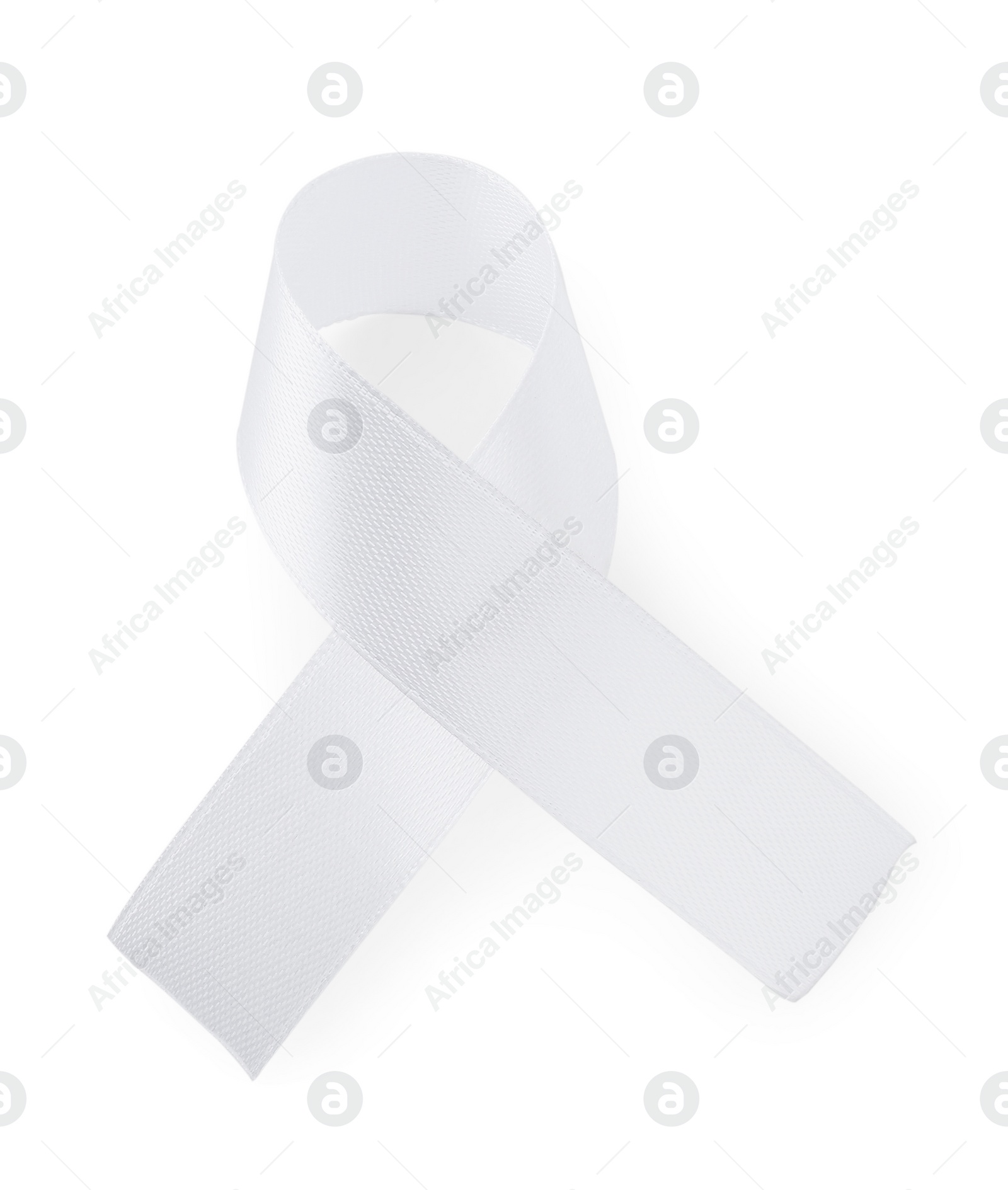 Photo of Awareness ribbon isolated on white, top view