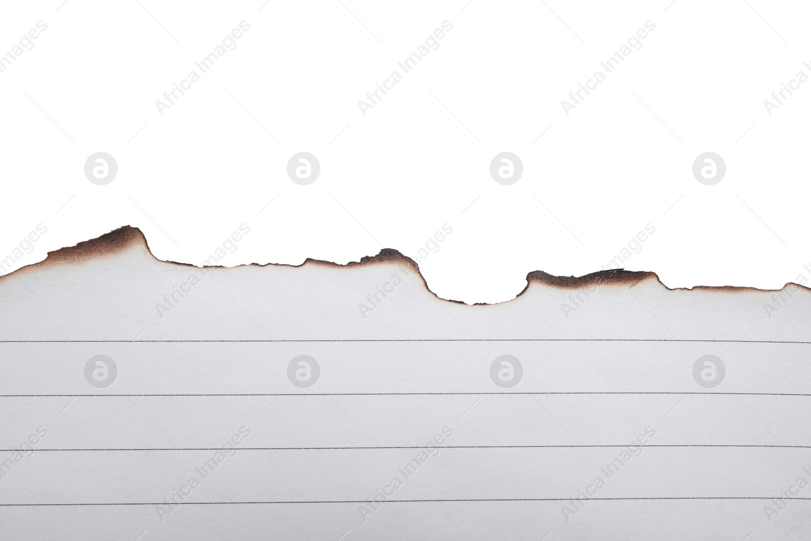 Photo of Piece of paper with dark burnt borders isolated on white, top view. Space for text