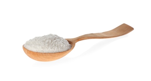 Photo of Wooden spoon with salt isolated on white