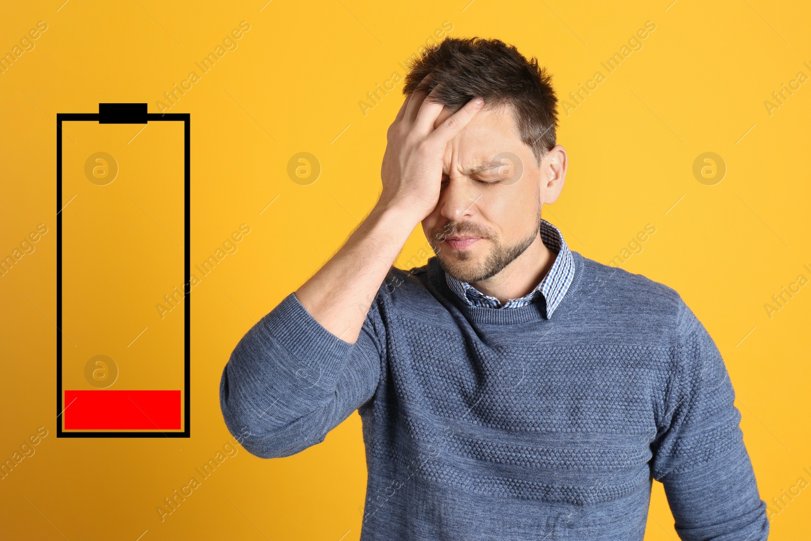 Image of Illustration of discharged battery and tired man on orange background. Extreme fatigue