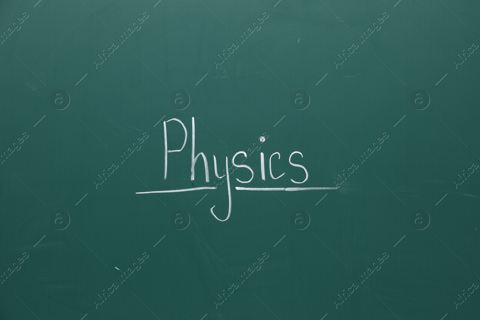 Photo of Word Physics written with chalk on green board