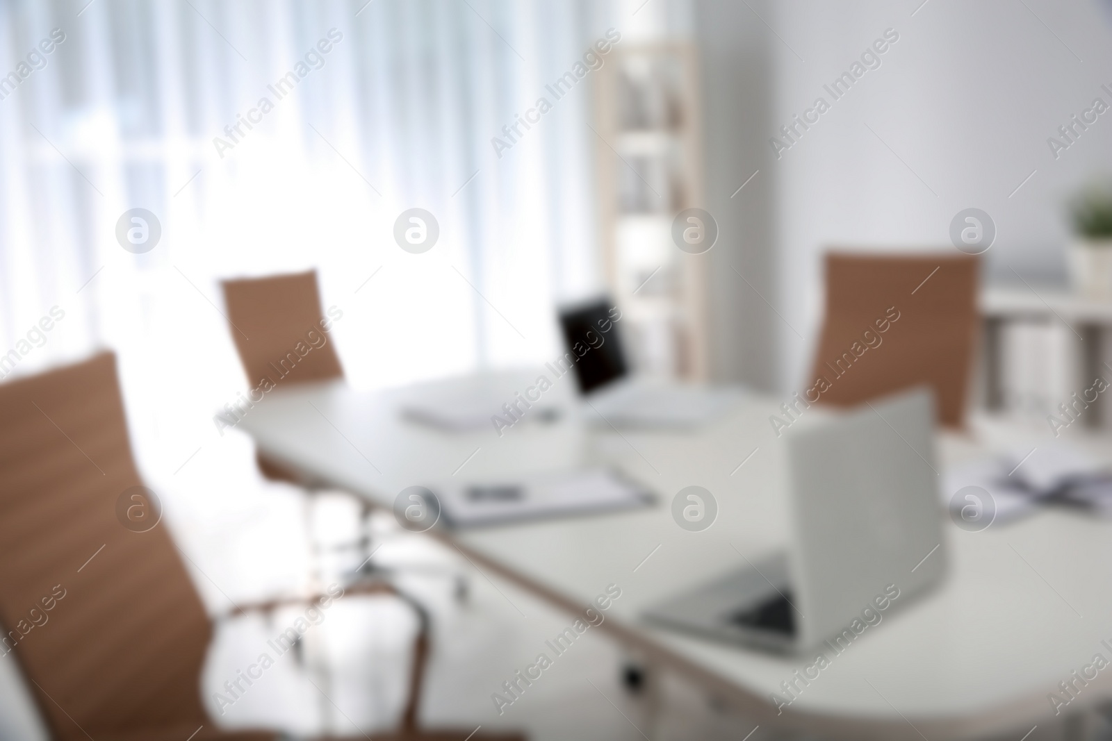 Photo of Modern brightly lit office with bokeh effect