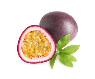 Photo of Cut and whole passion fruits with leaf isolated on white