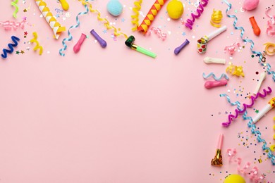 Photo of Flat lay composition with carnival items on pink background. Space for text