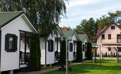 Photo of Exterior of beautiful modern white houses outdoors