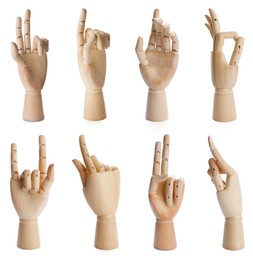 Image of Set with wooden hands of mannequins showing different gestures on white background