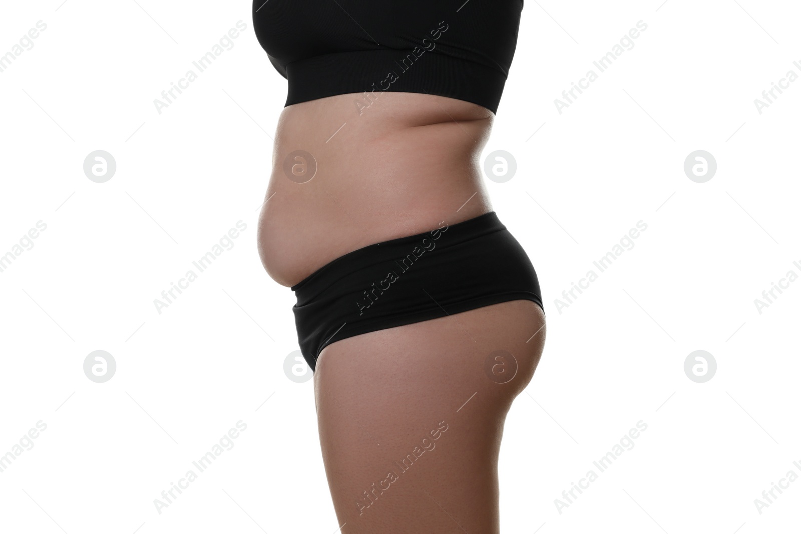 Photo of Woman with excessive belly fat on white background, closeup. Overweight problem