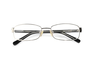 Photo of Glasses with corrective lenses on white background. Vision problem